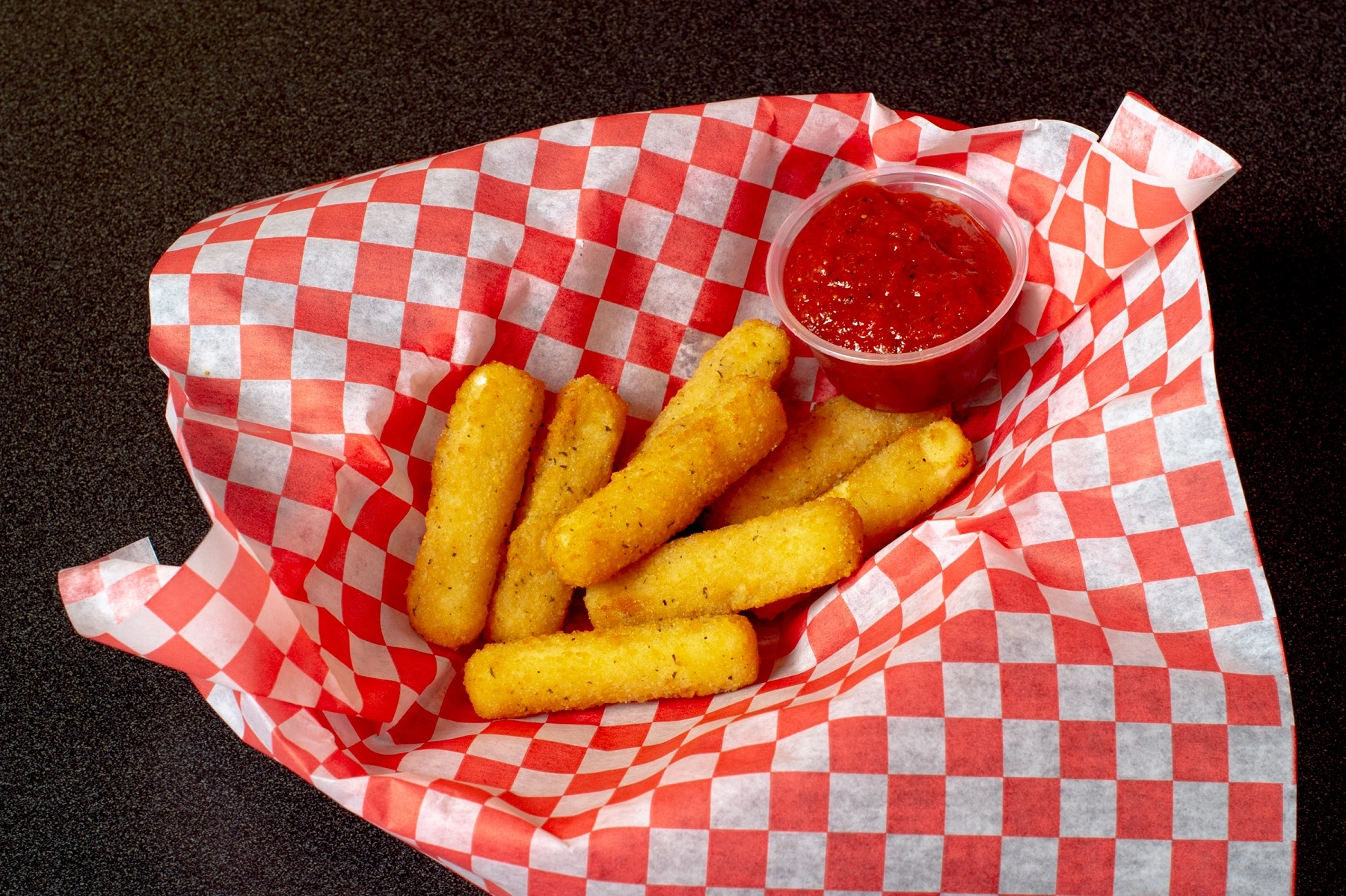 Fresh pizza with generous toppings at Firezone West Edmonton